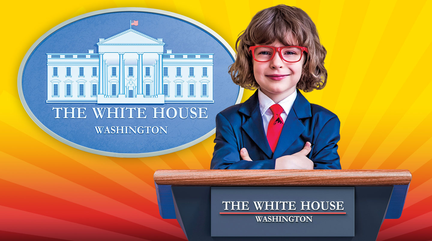 A young kid smiles at the white house podium